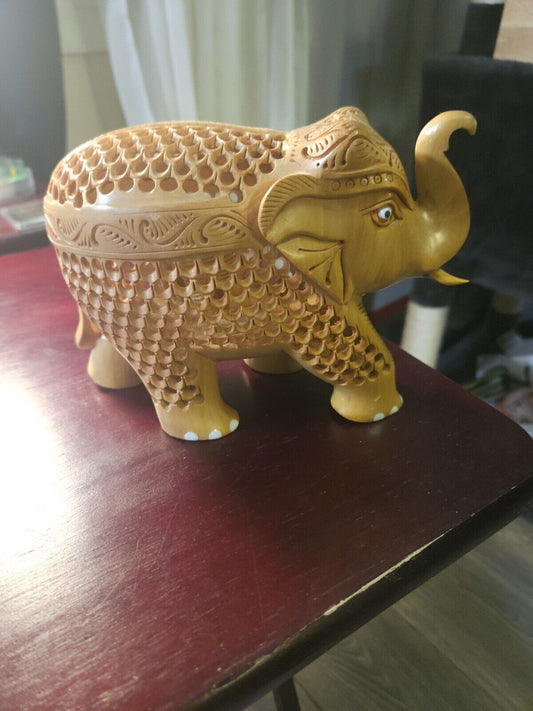 Benzara Hand Carved Wooden Elephant Statue With Cutout Work, Beige India Art Errors & Oddities