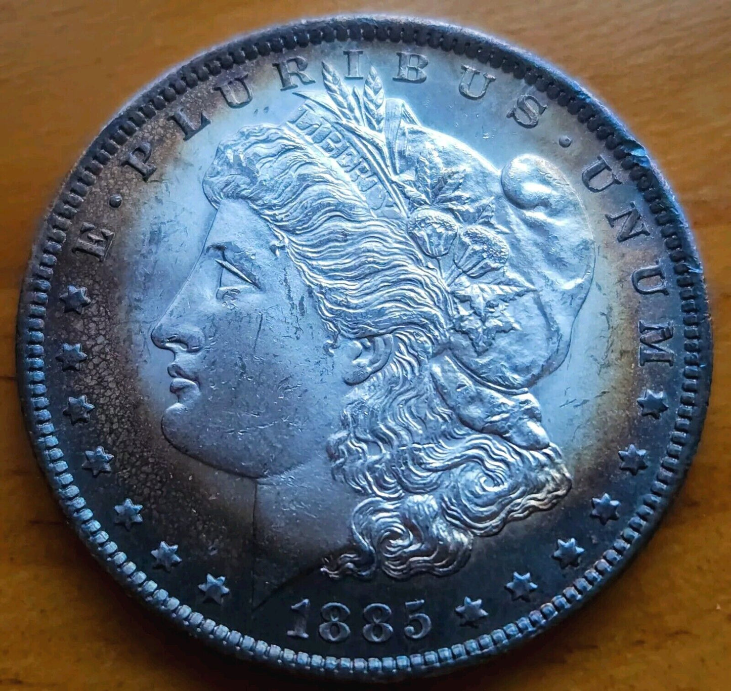 1885 O Morgan Dollar Gem Bu PL Monster Toned